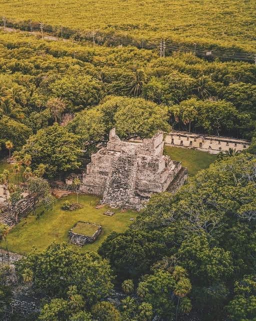 Ancient Mayan ruins at El Meco Cancun overlooking the coastline